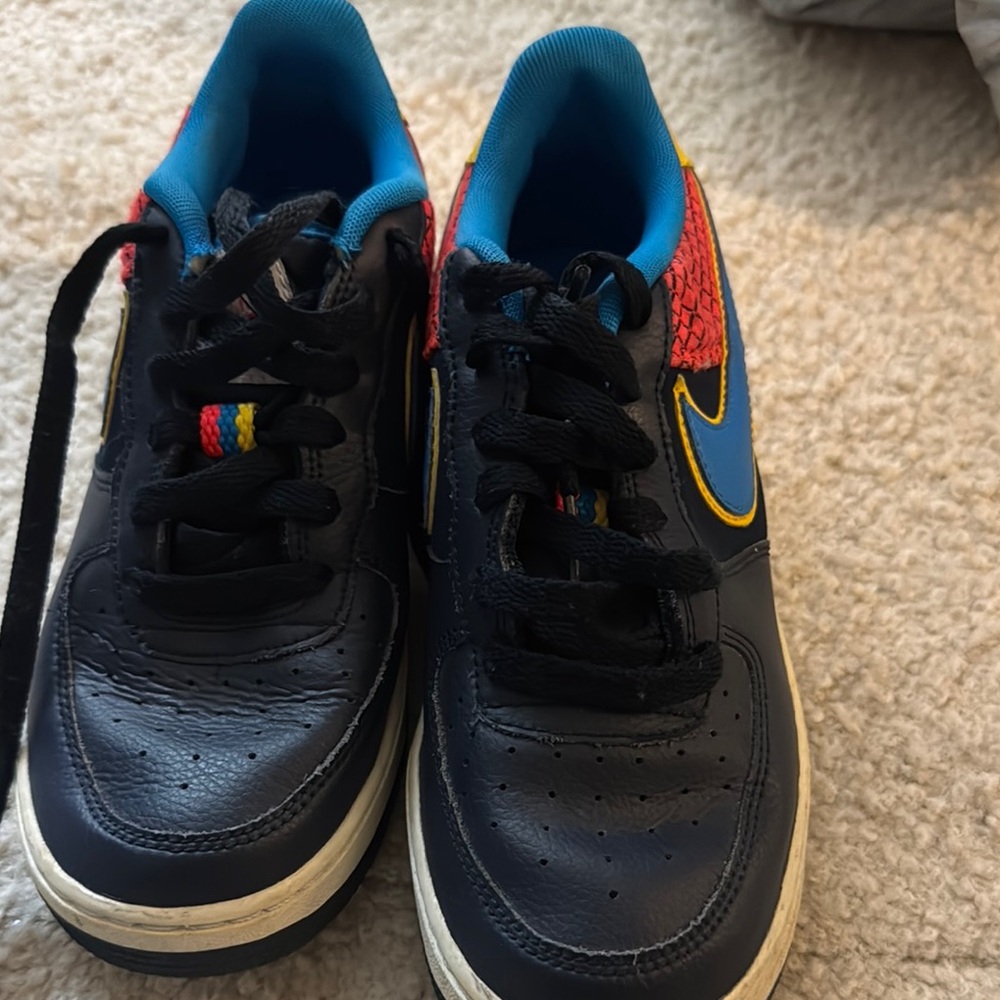 Nike Black and Blue Sneakers with Red Accents
